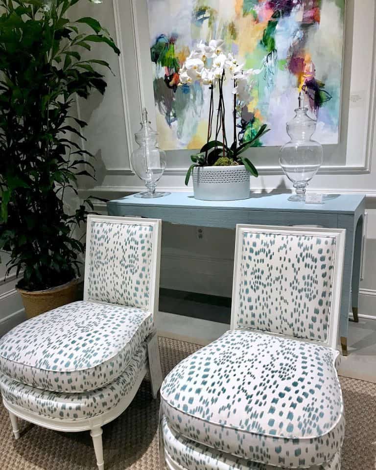 White chairs with schumacher leopard print