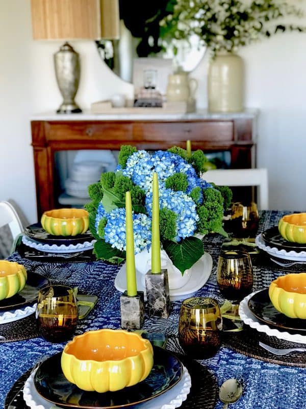 Blue and White Thanksgiving Table setting with pumpkin bowls