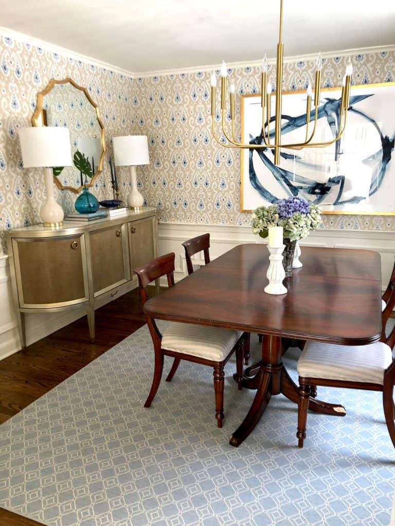 Updated Chandelier over a traditional dining Table