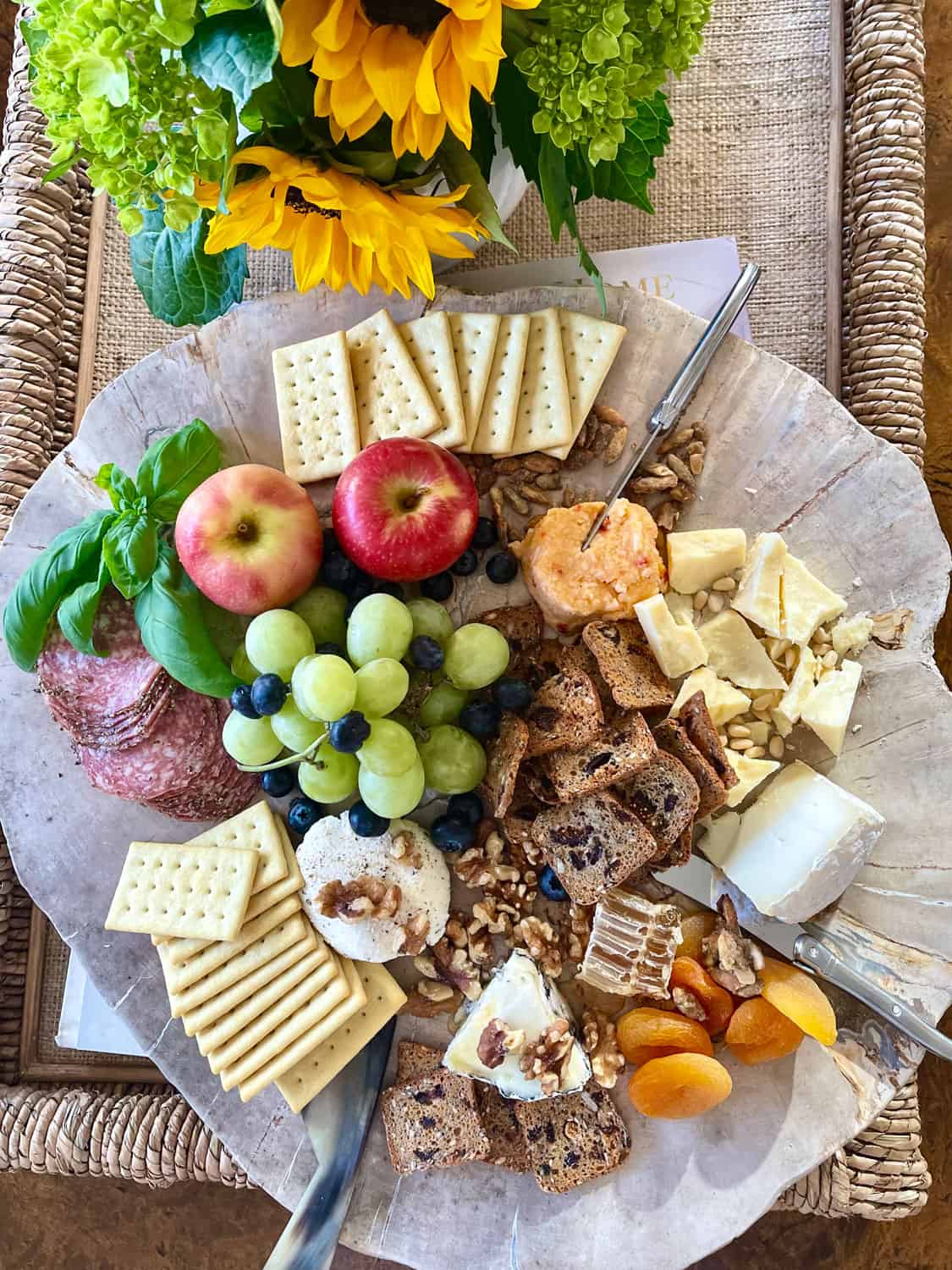 Cheese platter with nuts and fruit