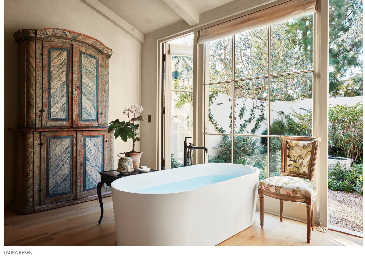bath tub open to enclosed garden