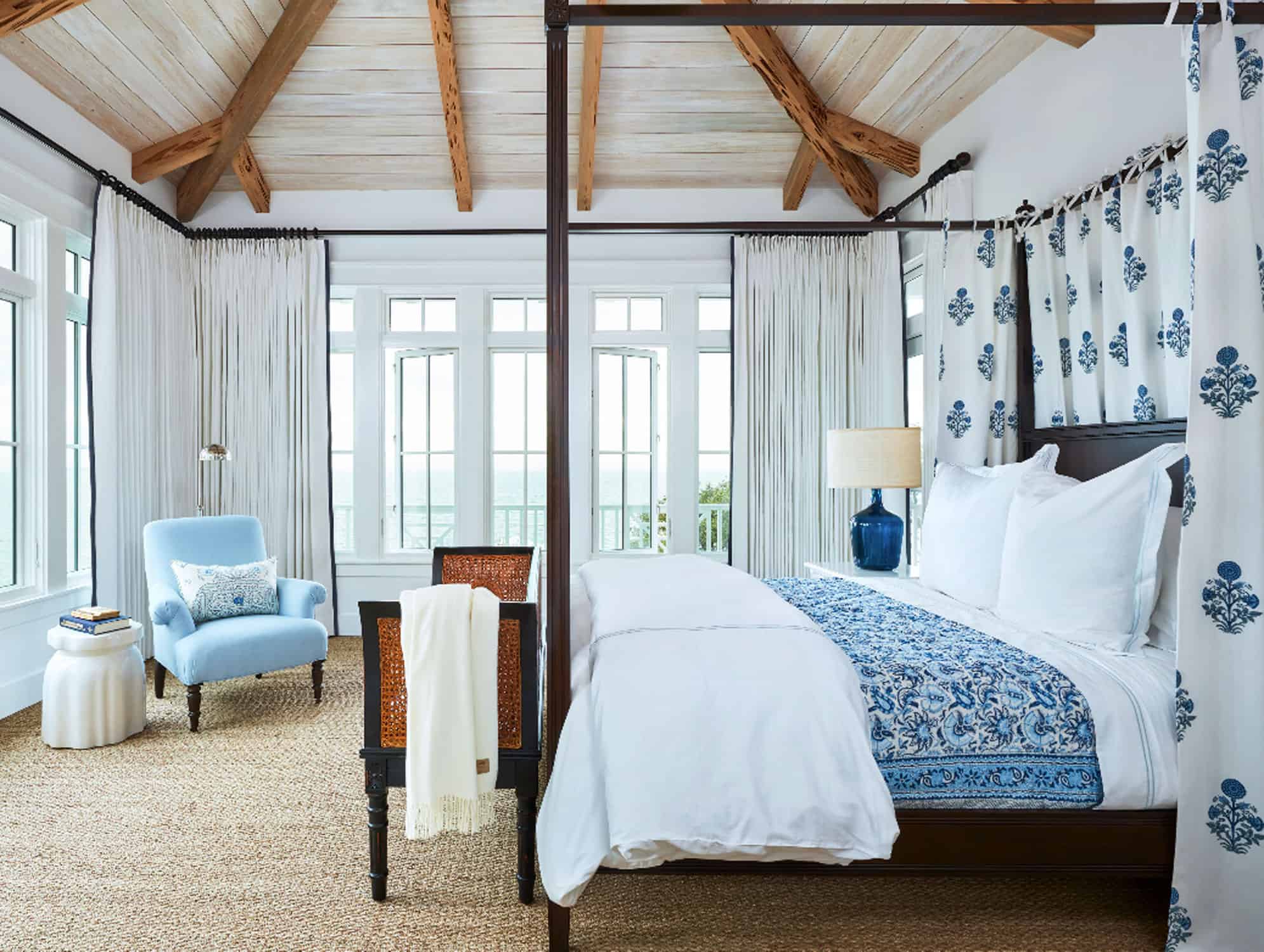 Blue and white four poster bed