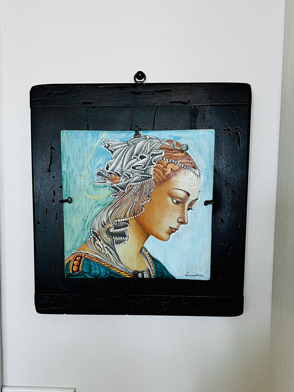 painted Italian tile of a Madonna