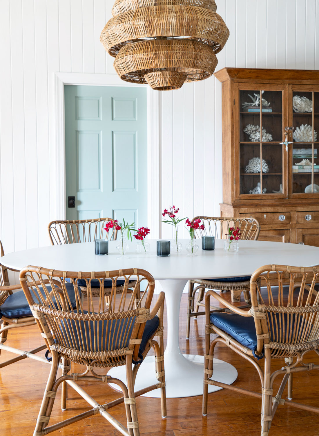 beach dining room with coral and rattan