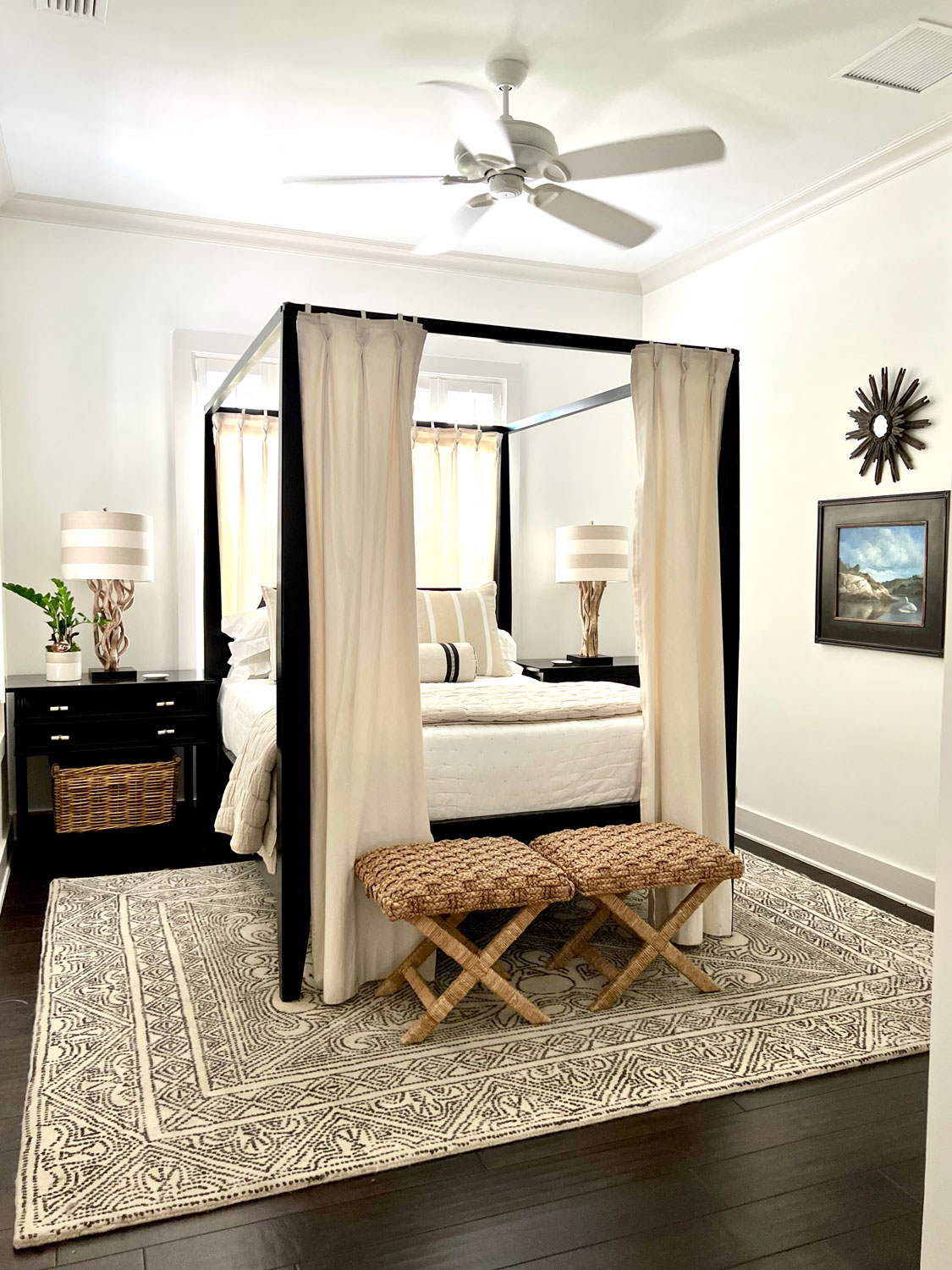 neutral bedroom with four poster bed