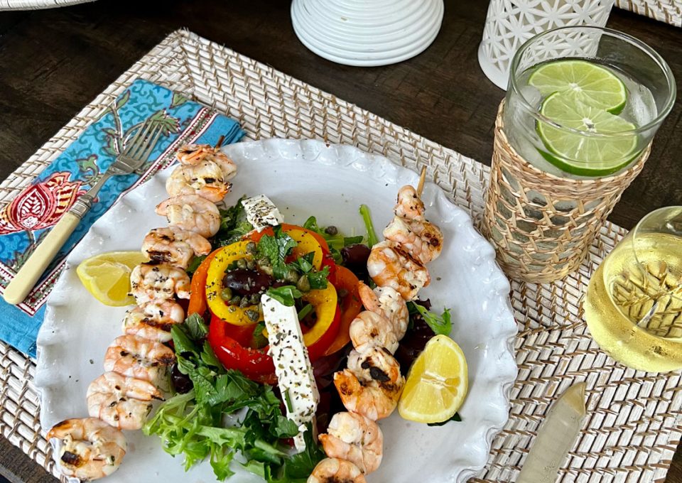 garlic shrimp skewers and Greek salad