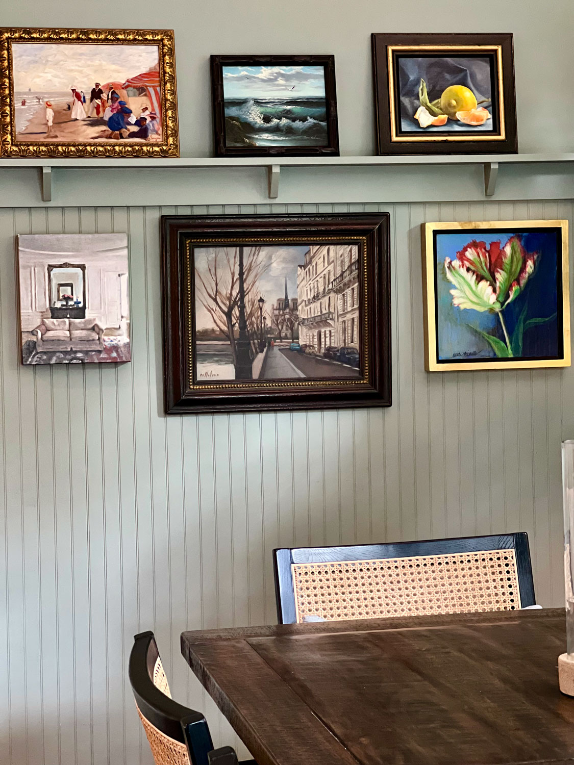 oil paintings in dining room
