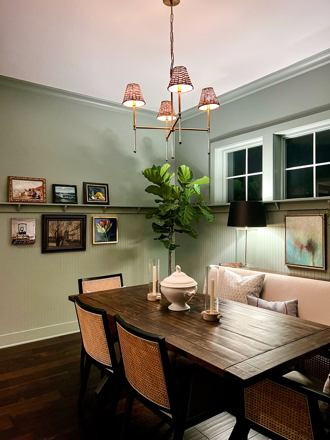 informal dining room with art wall