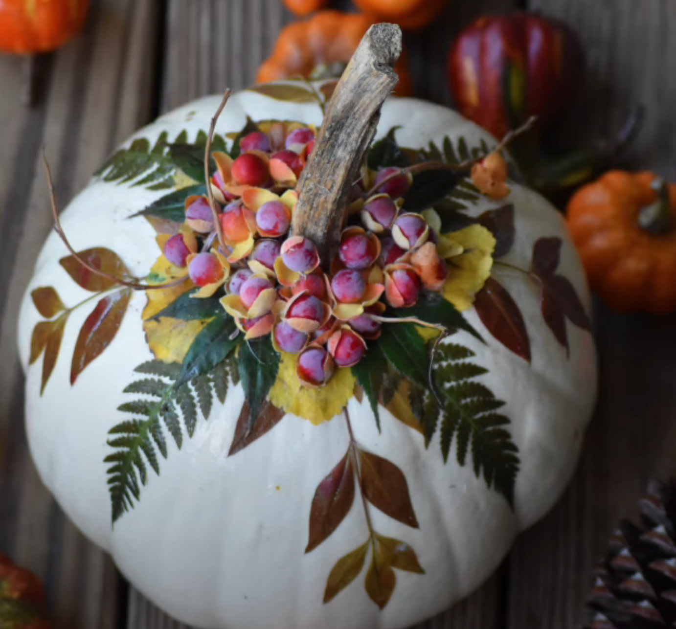 embellished pumpkin with leaves