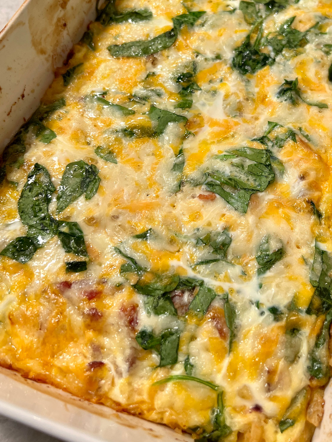 Egg and Saltine casserole with chopped Spinach