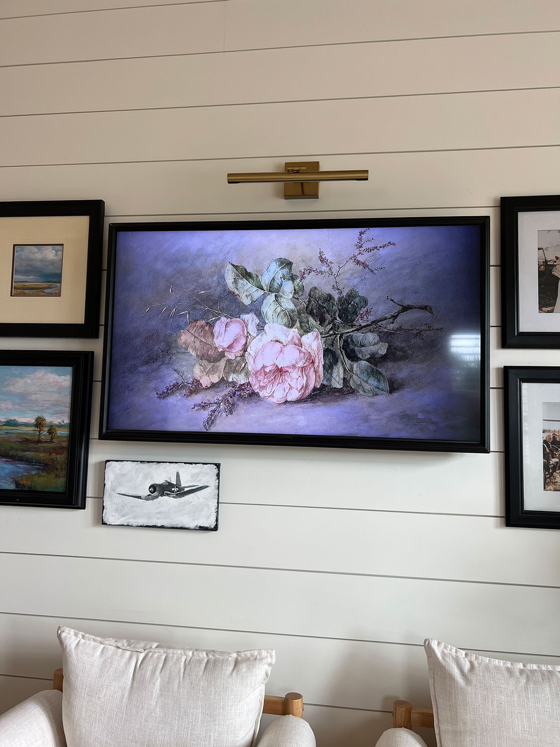 frame tv in gallery wall