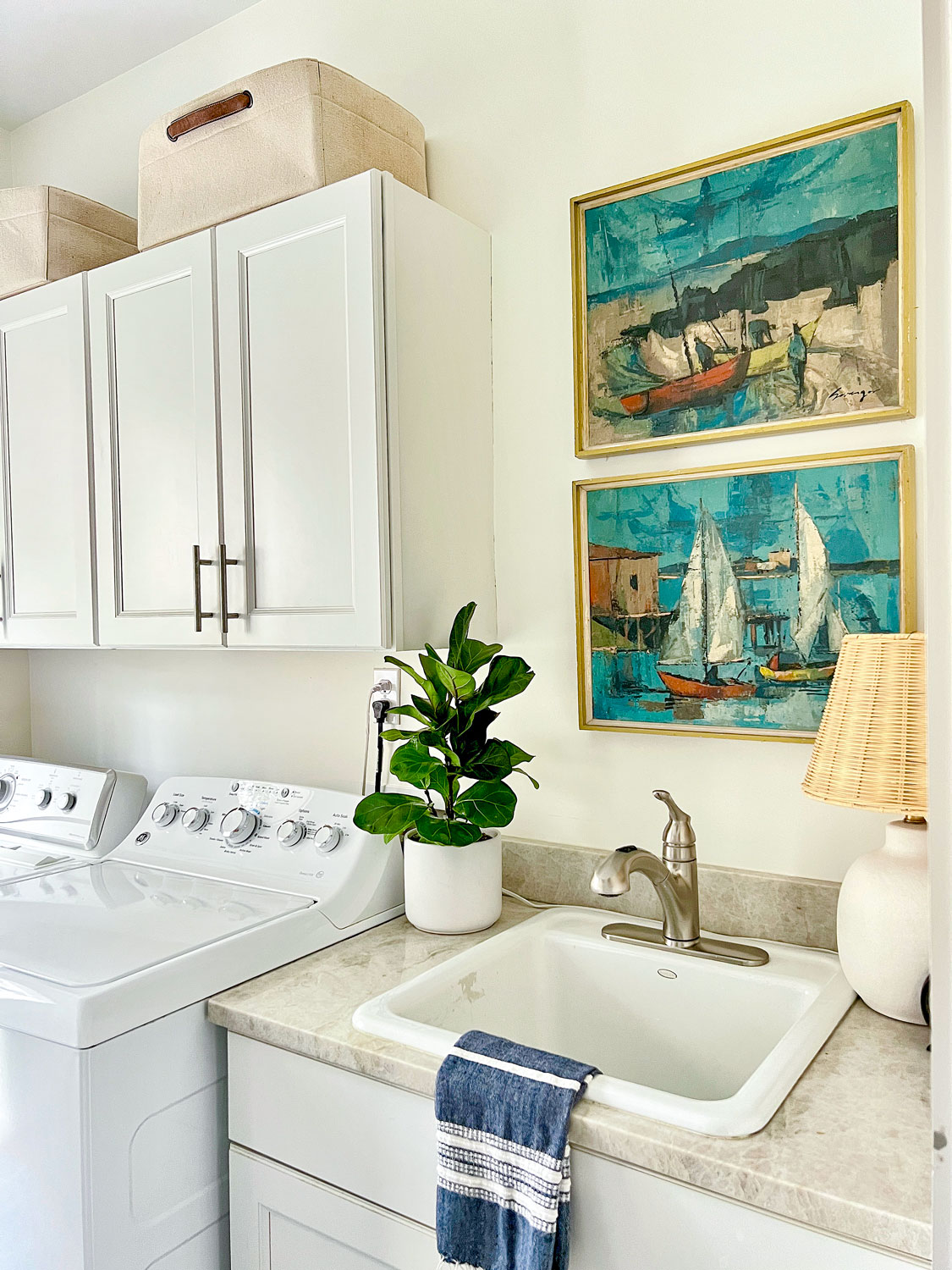 art and lamp accessories in laundry room