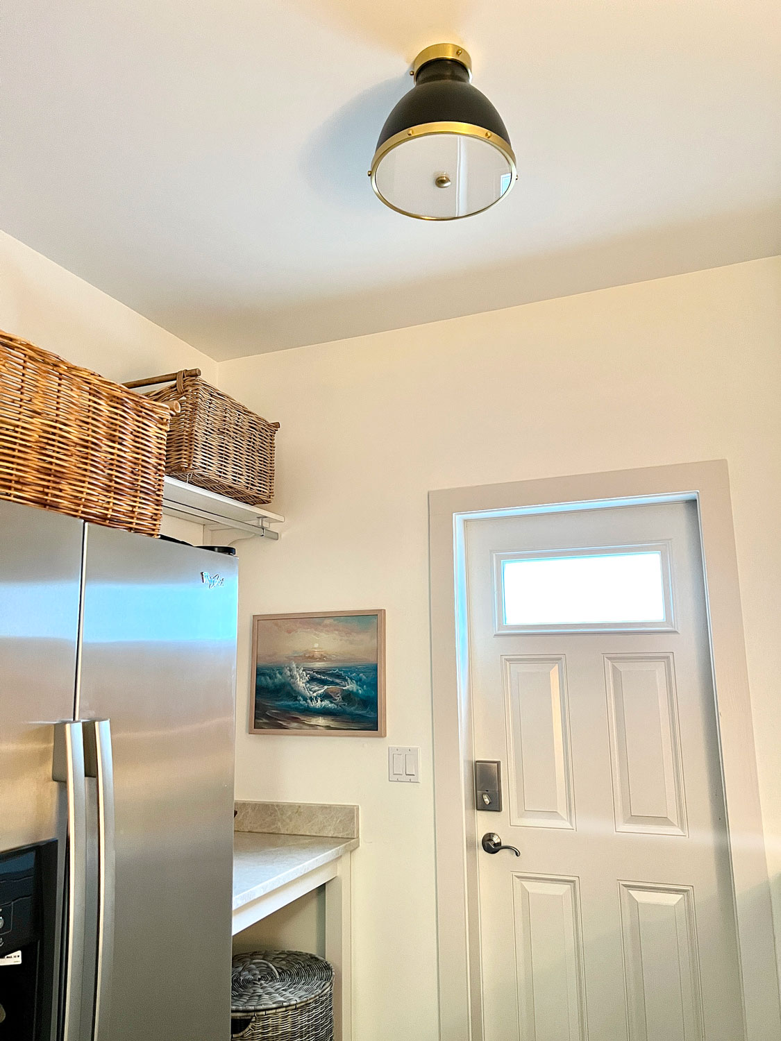 lighting and painting to make a laundry room prettier