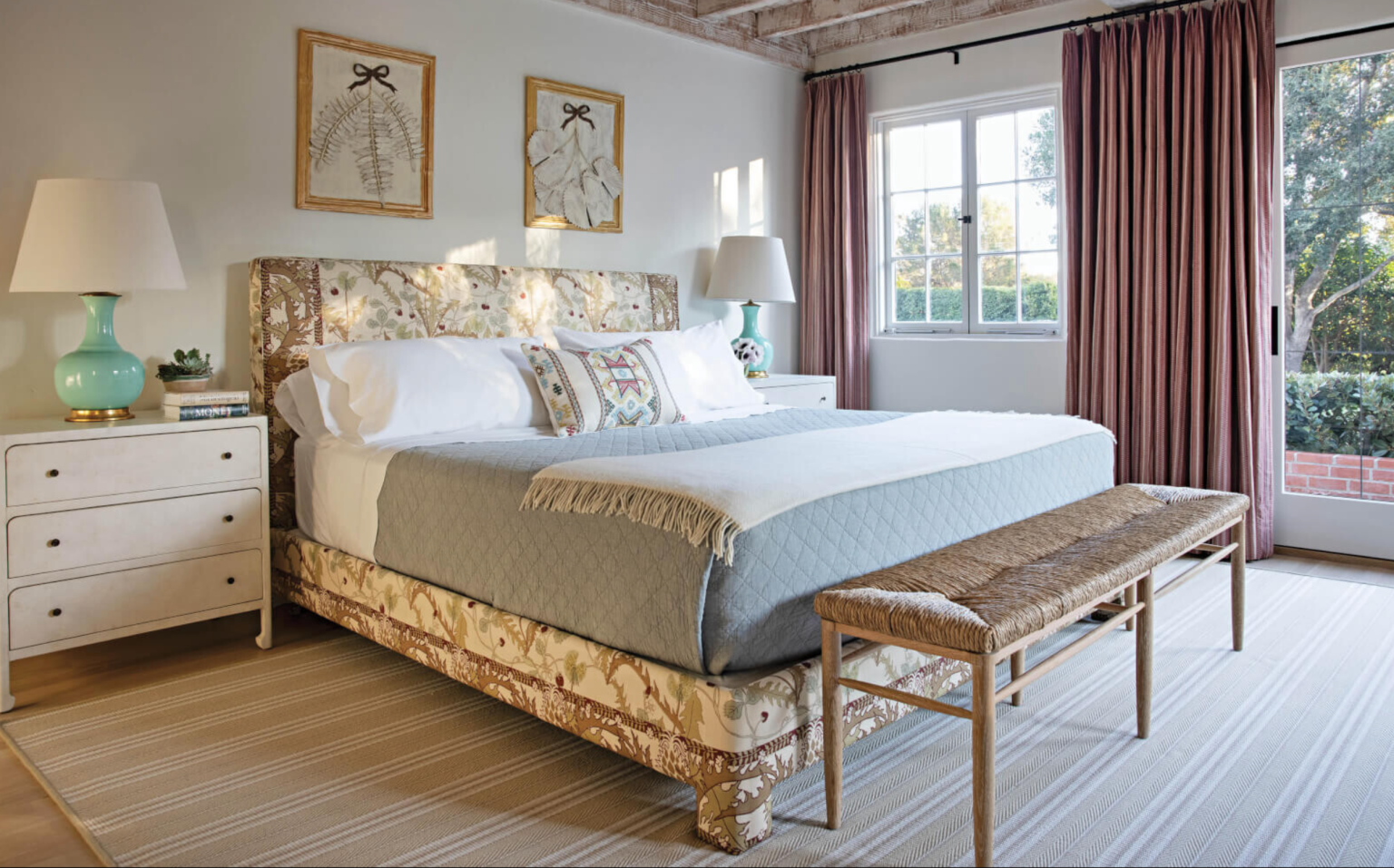 primary bedroom with wicker stool