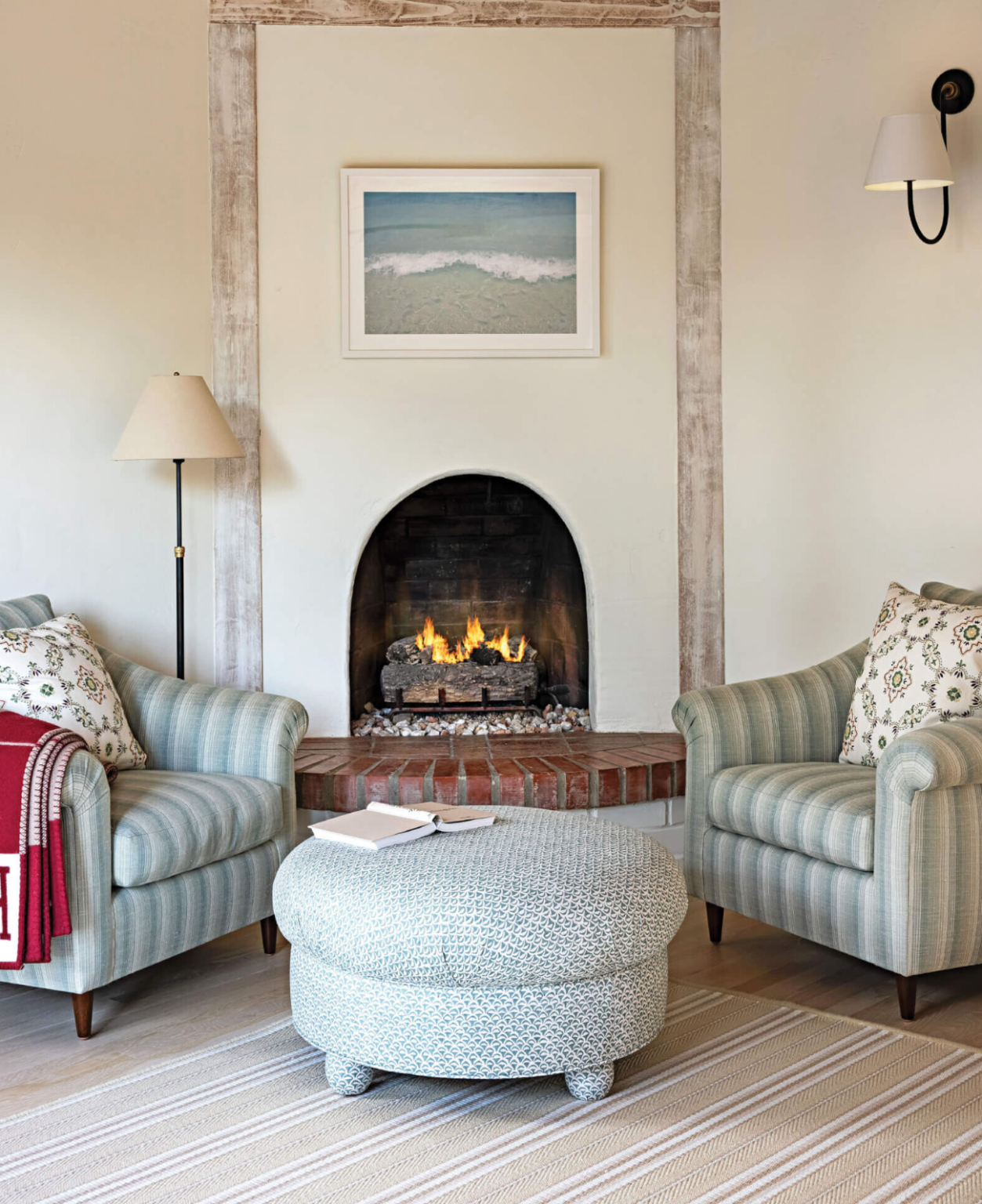 fireplace with tow chairs