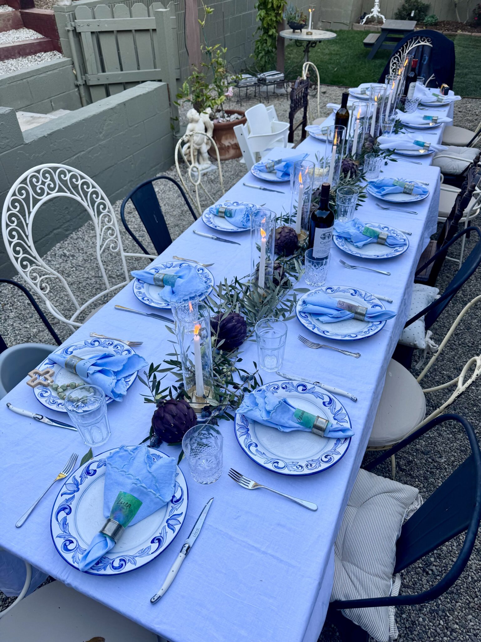 table set with artichokes and olive branches